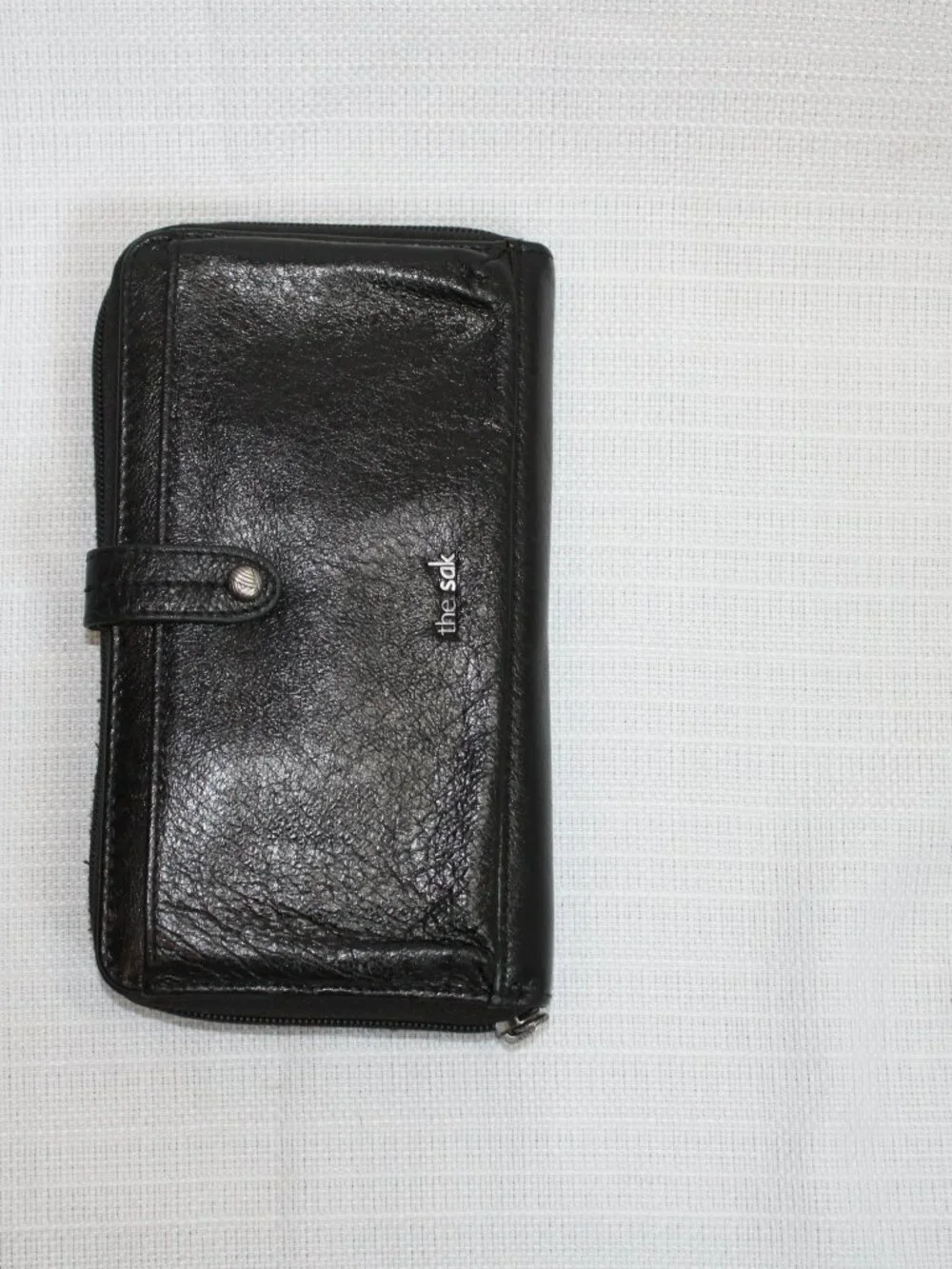 The Sak Black Leather Convertible Clutch Crossbody Wallet